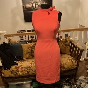 Peachy/orangy vibrant.dress with cute bow!